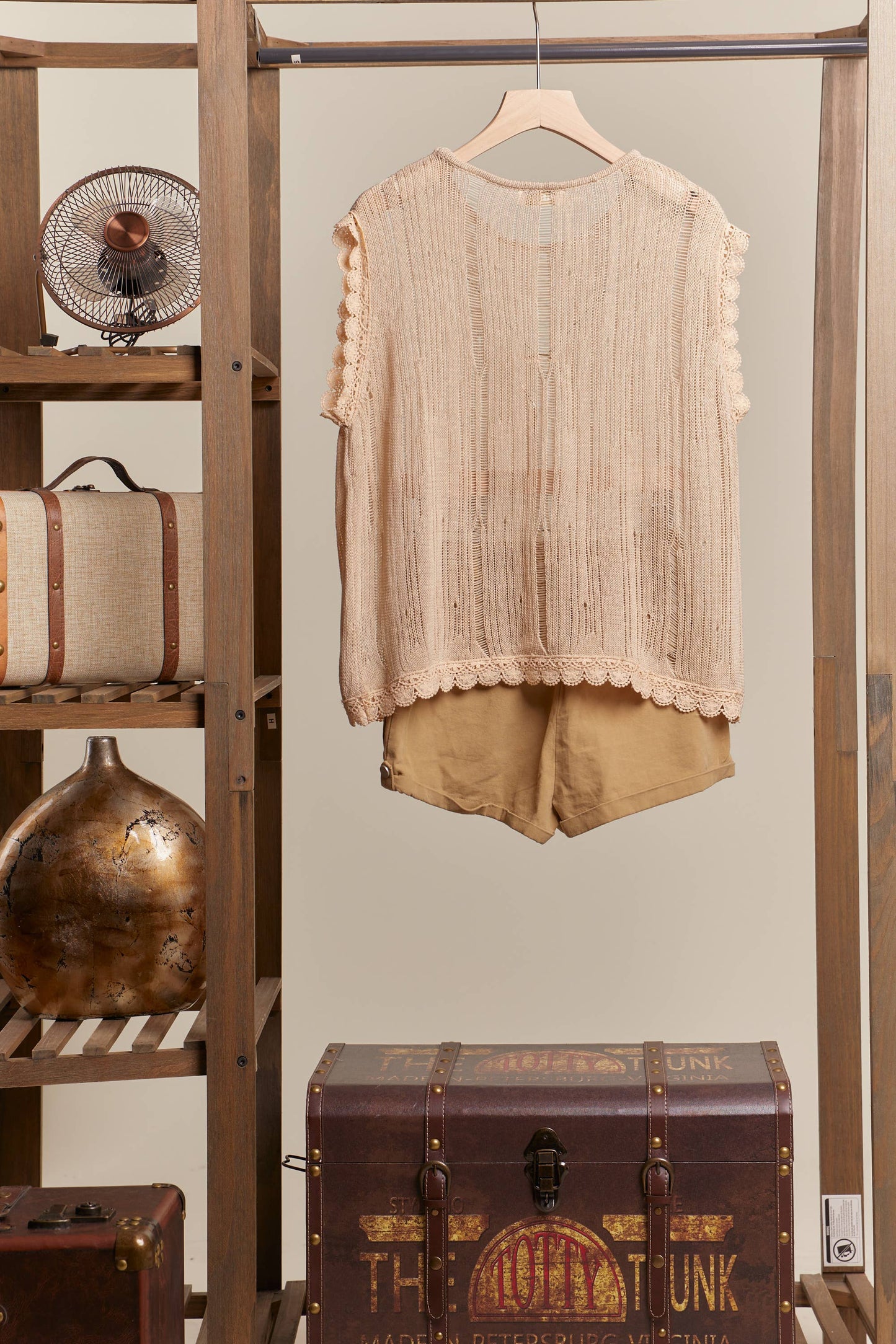 Boat Neck Sleeveless Top with Lace Hem