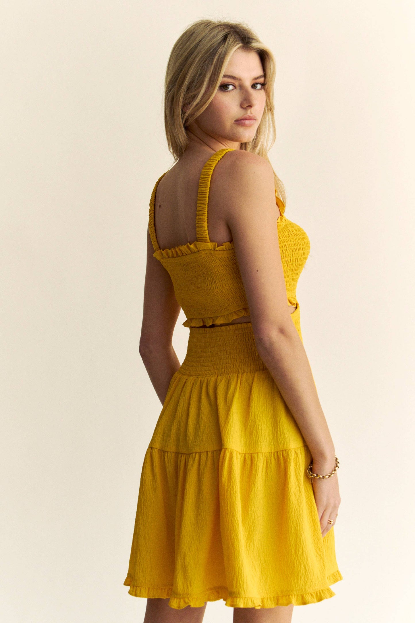 TEXTURED OPEN BACK SMOCKING CUT OUT MINI DRESS