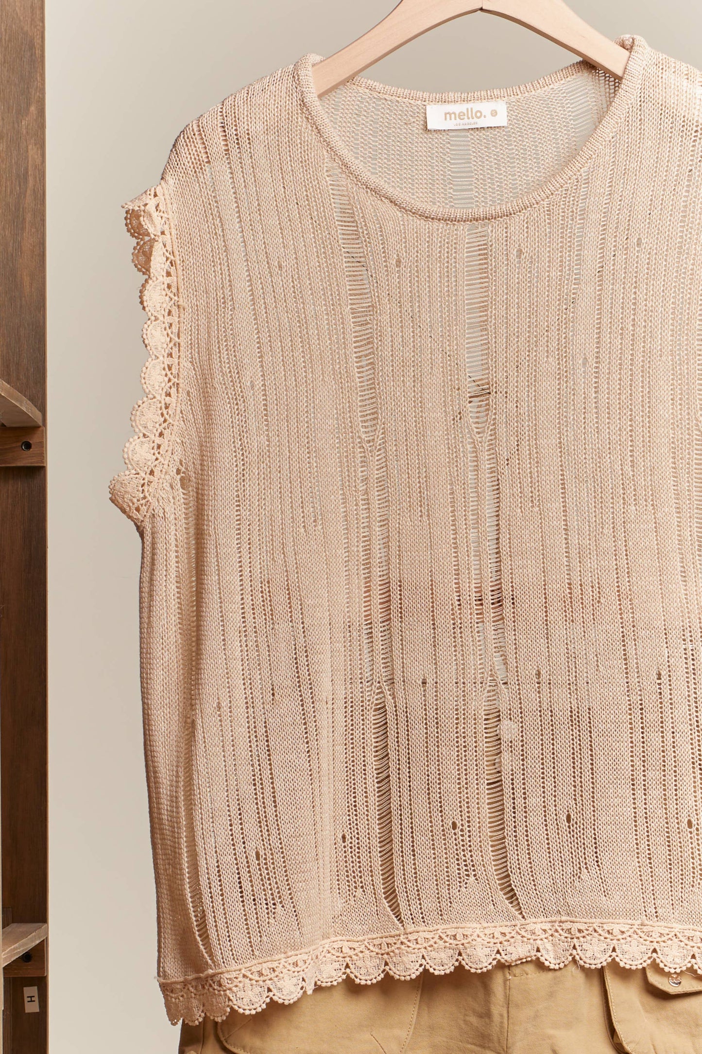 Boat Neck Sleeveless Top with Lace Hem